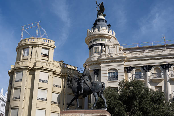 Urban view of Seville featuring its typical Andalusian architecture, colorful buildings, wrought-iron balconies, and Mediterranean atmosphere under the sunny southern Spanish sky.