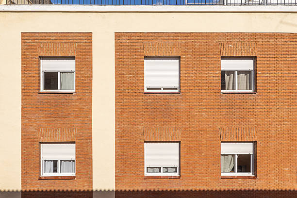 istock Square windows on the facade of a residential building 2241485412