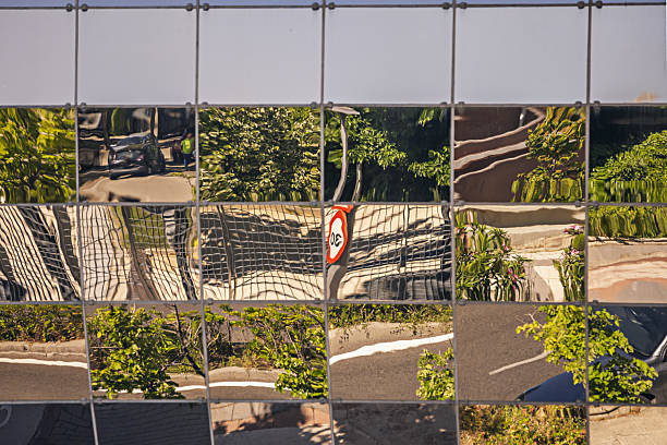 The doors and windows are neither equidistant nor symmetrical in relation to the central axis of the building 2