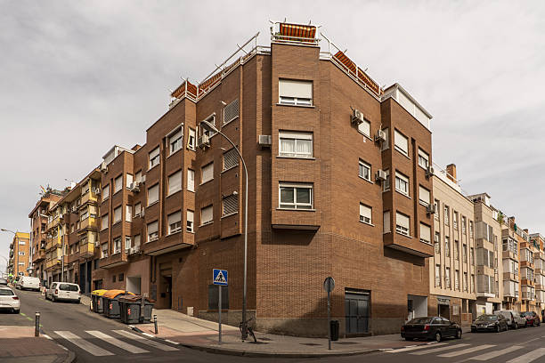istock a building with windows of various formats and facades facing two different streets 2241486451
