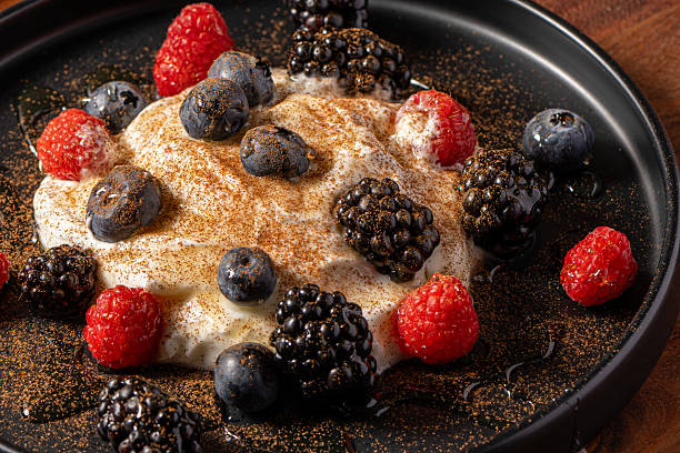 istock Greek yogurt with fresh berries 2241496637