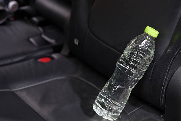 istock Drinking water in the car prepared for traveling 2241496725