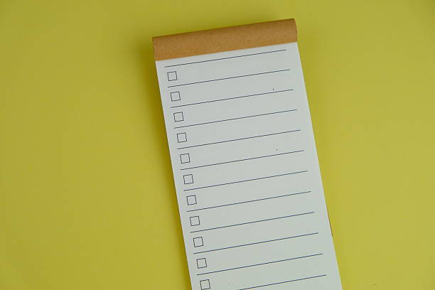 istock blank memo pad next to school tools with no word as a template for text space concept. business and education concept 2241501207