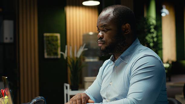 istock Exasperated black guy in tension getting angry due to intense workload 2241503783