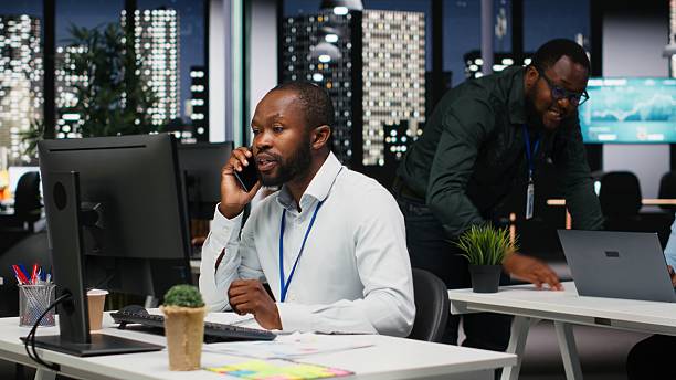 istock Corporate black worker in negotiation over the phone line 2241503840