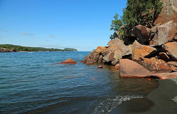The red beach of Tsonia and the turquoise Aegean Sea on the volcanic Greek island of Lesbos - background or wallpaper for your project