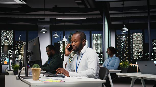 istock African american consultant makes important phone call after hours 2241508238