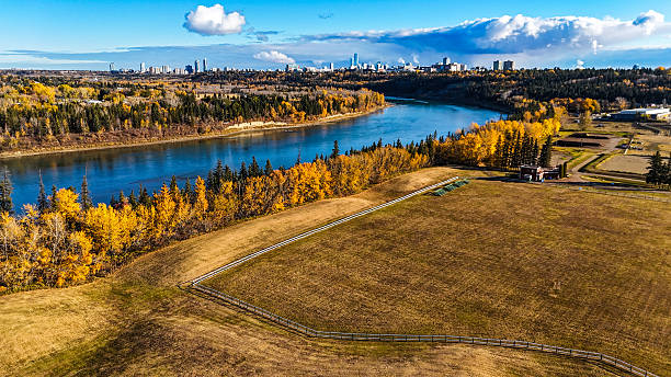 istock Drone view of river bend with vibrant autumn forest 2241508305