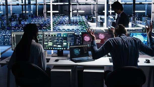 istock Irked data center programmer smashing desk, upset by malfunctioning AI gear 2241509545