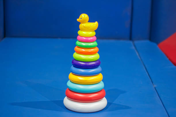 Colorful Stacking Toy with Rubber Duck on Top.