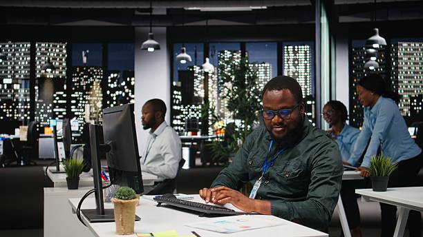 istock African american consultant engaged in planning and analysis with computer 2241515328