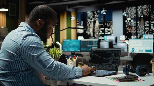 istock Angry concerned black man losing money with forex trend going down 2241515909