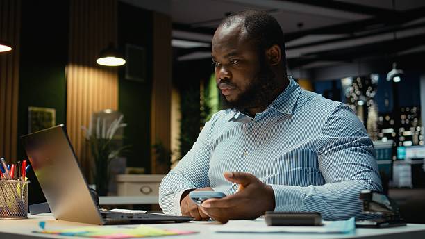 istock Overworked male worker checking calendar before scheduling engagement 2241516676