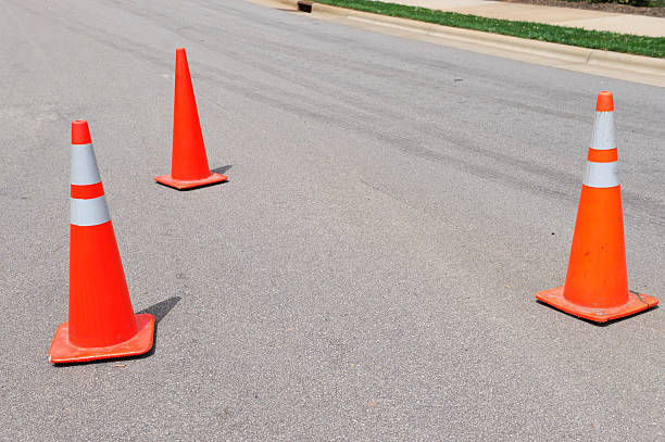 istock traffic cones on the street 2241530393
