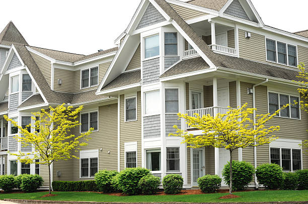 istock apartment building with spring trees landscape 2241530669
