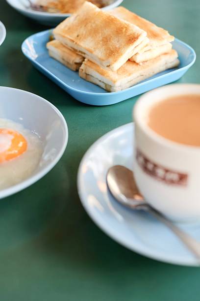 A cup of milk tea with kaya toast at Maxwell in Singapore
