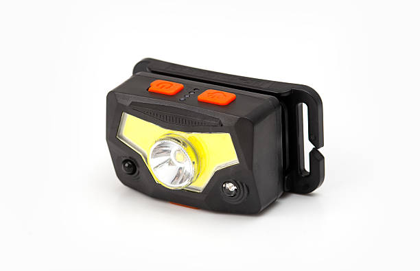 istock Black headlamp with orange buttons isolated on a white background. 2241541751