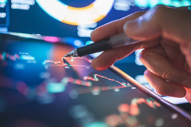 istock Modern digital tablet showing AI data dashboard and finance chart under ambient light. Represents machine learning, big data visualization, and smart financial management in the new digital world. 2241543585