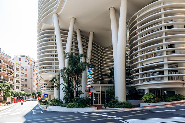 Monaco, Monaco - June 28, 2025: Modern architecture of Honoria Tower with wavy facade and supporting columns