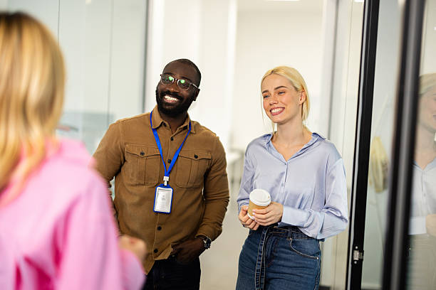 istock Diverse business colleagues talking during office coffee break 2241552989