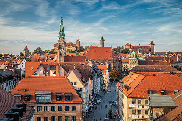 Nuremberg’s pedestrian zone in the historic old town, featuring colorful medieval rooftops and the twin towers of St. Sebaldus Church. Nuremberg in Middle Franconia, Bavaria in Germany - Europe