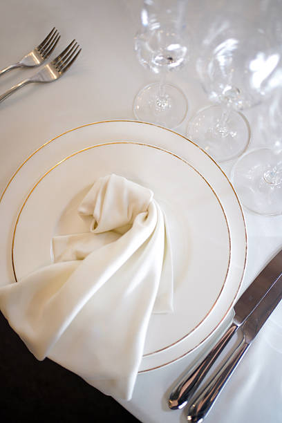 istock A set table with plates, napkins, cutlery and glasses. 2241554510