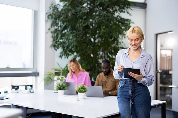 istock Businesswoman using digital tablet in modern office 2241554645
