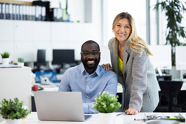 istock Diverse business colleagues collaborating in modern office 2241556380