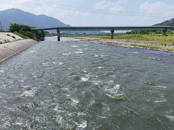 istock A bridge spans a river with a lot of water 2241557060