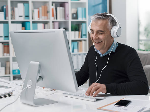 istock Man watching streaming videos online 2241562960