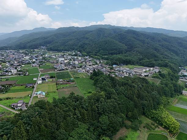 istock A lush green hillside with a small town below 2241569514