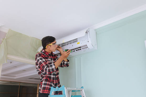 istock Professional technician servicing and repairing home appliances and fixtures 2241573429