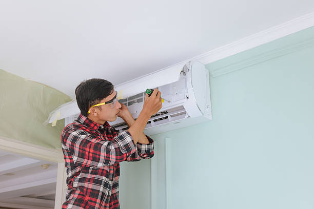 istock Professional technician servicing and repairing home appliances and fixtures 2241573432