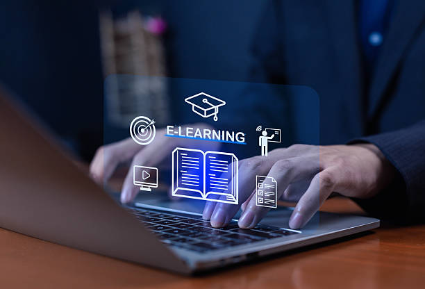 istock Businessman using laptop for e-learning with digital education icons, online training, knowledge management, and virtual classroom concept for modern technology and distance learning solutions. 2241573644