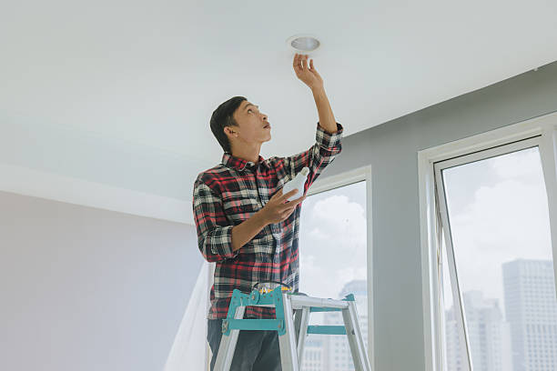 istock Professional technician servicing and repairing home appliances and fixtures 2241573719