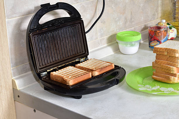 istock Grill or sandwich maker or waffle iron in working order. 2241574349
