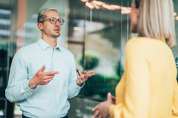 istock Business colleagues talking in the office 2241575513