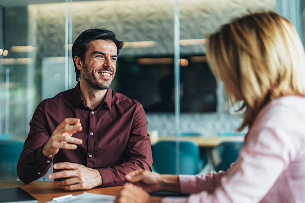 istock Professional business discussion and presentation in modern office environment 2241576124