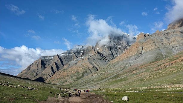 istock Majestic mountain range with clear blue sky and some clouds 2241577792