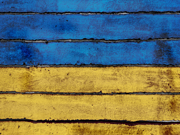 istock explosion damaged blue yellow house wall war in Ukraine 2241579404
