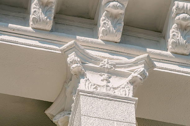 istock Renovated old building reflects elegance with stunning white stucco cornice 2241580952