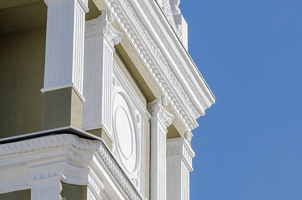 istock Renovated old building reflects elegance with stunning white stucco cornice 2241580984