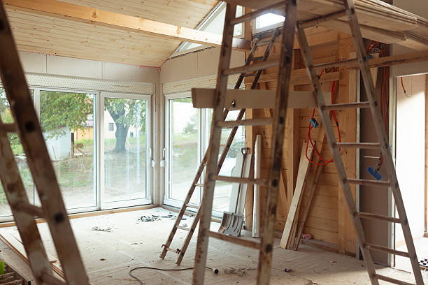 istock Interior View Of Wooden House Under Construction With Ladders And Building Tools 2241581777