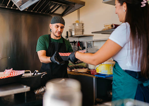 istock People working in food truck 2241583521