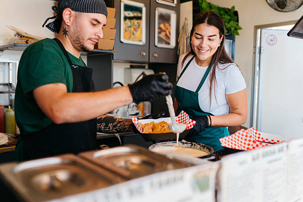 istock People working in food truck 2241583683