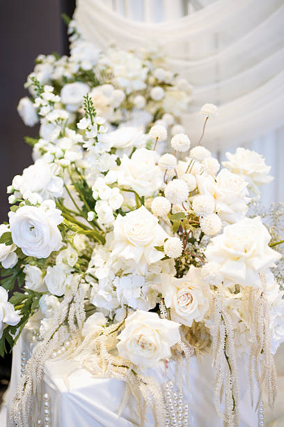istock The wedding background is decorated with white and blue flowers 2241584500