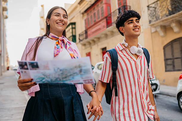 istock Couple Walking Through The City In Valletta Malta 2241586207