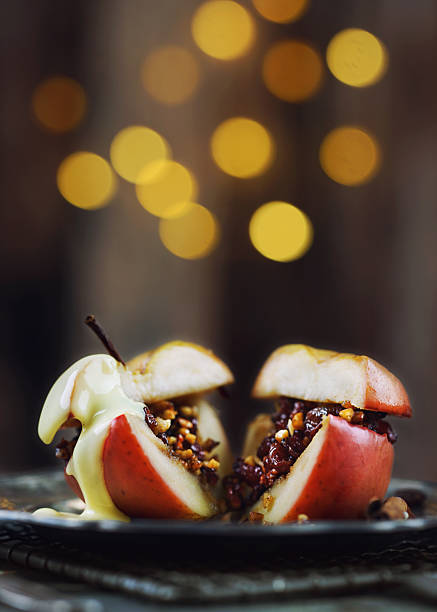istock sliced christmas baked apple with vanilla sauce 2241587094