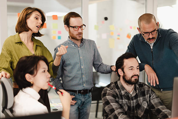 istock Business team collaborating in a modern workspace to discuss project ideas during a brainstorming session in the afternoon 2241591465