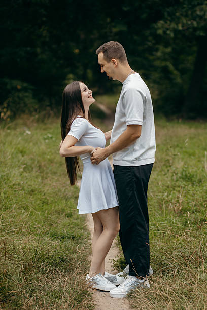 istock Young couple walking at nature at summer 2241598639